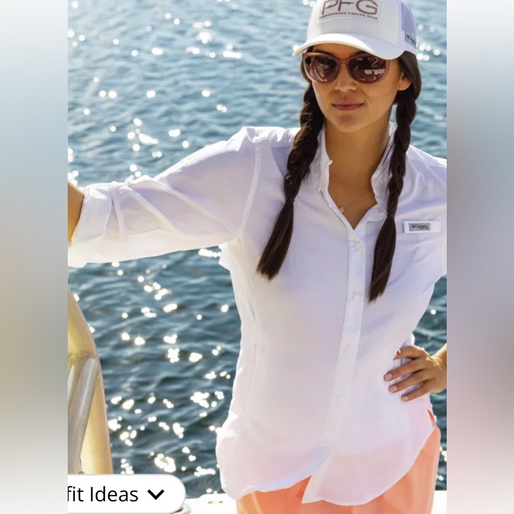 Really nice Columbia women fishing shirt 2x. Snap front zippered pockets vented